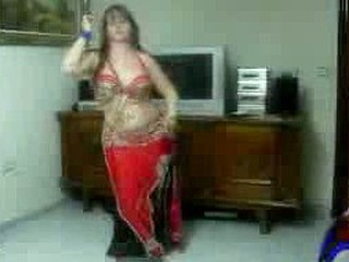 Amateur sexy Arab dances in full costume for the webcam on top of her laptop in this intimate video. You can watch her dance around the room and shake her stomach and ass