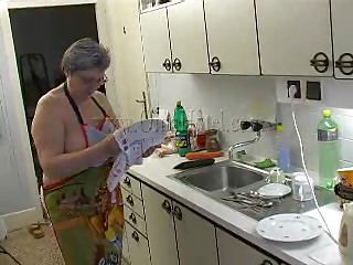 Hawt granny Gerlinde washes the dishes naked, wearing only a kitchen gown. This babe becomes turned on because she has not played for a while now. The old slut starts squeezing her saggy bra buddies and takes off her white panties so that she could reach more easily her wet cunt. What`s she doing laying naked on the floor?